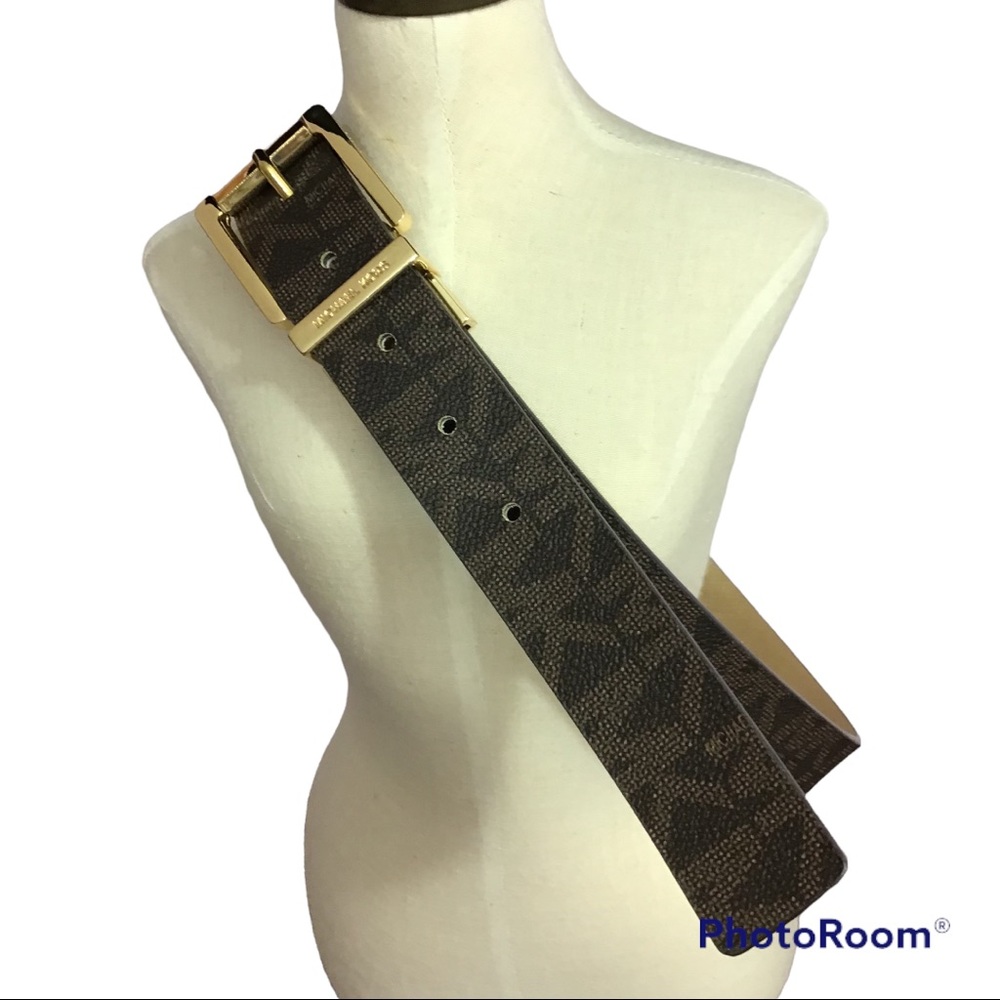 Michael Kors reversible synthetic leather belt .